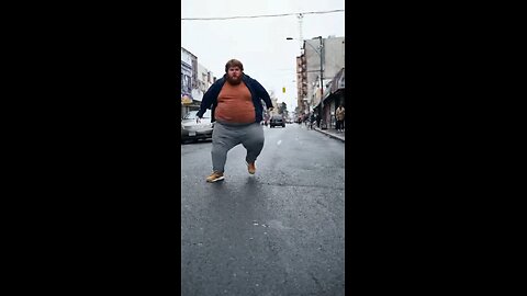 Fat man jumps and makes a hole in the road