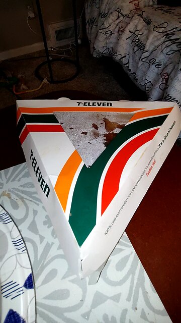 Eating Pizza, 7-Eleven, Dbn, MI, 12/31/25