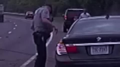 Dashcam video shows officer on side of road narrowly escape careening BMW