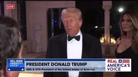 President Trump takes questions while Hail to the Chief plays in the background