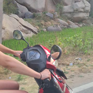 Barefoot riding a scooter!!🛵#hampi #india