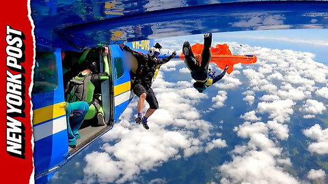 Heart-stopping moment skydiver's parachute gets hooked on plane's tail -- leaving him dangling 15,000 feet in the air