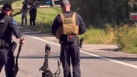 A bomb squad robot has arrived at the house of the suspect in the Genesee County, Michigan shooting. 