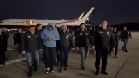 Close up video of Nicolás Maduro being escorted out of a plane by US authorities