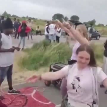 French girls dance for fake asylum seekers.