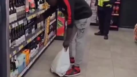 The security guard observes and does not intervene. Immediate dismissal.