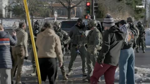 New video obtained by the BBC shows Alex Petti armed, spitting on federal agents