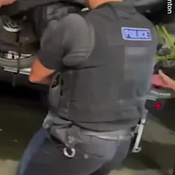 A couple who found a migrant hiding inside their bike rack after crossing the