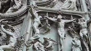 The 5 bronze doors of Milan's Duomo will keep you staring for hours.