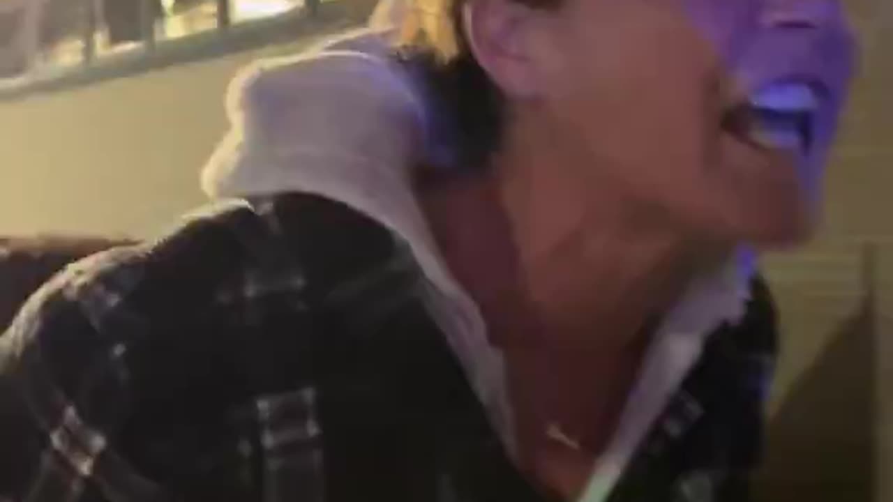 Liberal Karen loses her mind when parent shows up in a pick up truck with flags on the back.