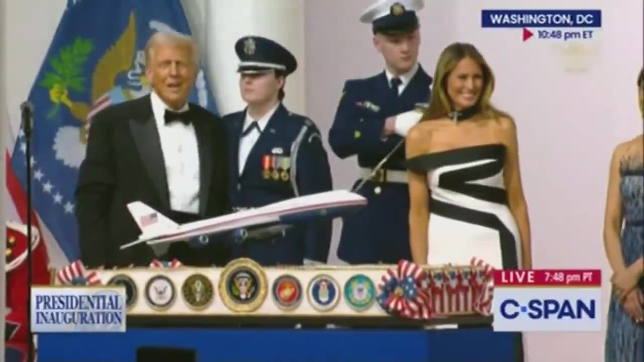 President dancing while waving a sword in the air