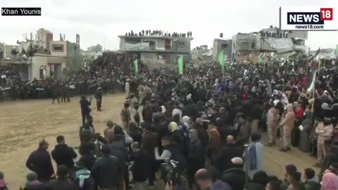 photos as the children dance in the crowd