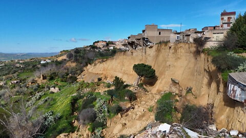 Massive landslide leaves cars, homes dangling off cliff in Sicily