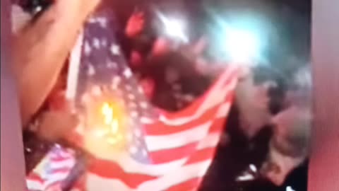 Ice protesters burn American flag....