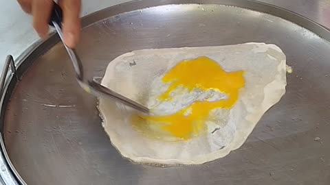 Roti making with egg