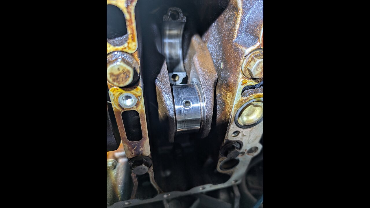 Polishing a crank journal without machine shop in car with a shoe string.