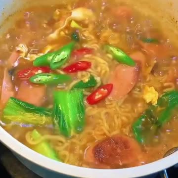 Cook a bowl of scallion and ham ramen that will ma