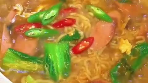 Cook a bowl of scallion and ham ramen that will ma