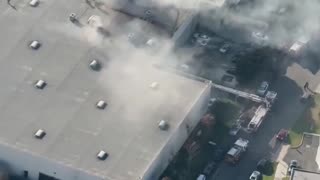 A small plane has crashed into a commercial warehouse in Fullerton, California