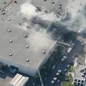 A small plane has crashed into a commercial warehouse in Fullerton, California