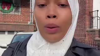 Muslim woman says the government promised handouts, so she’ll take them.