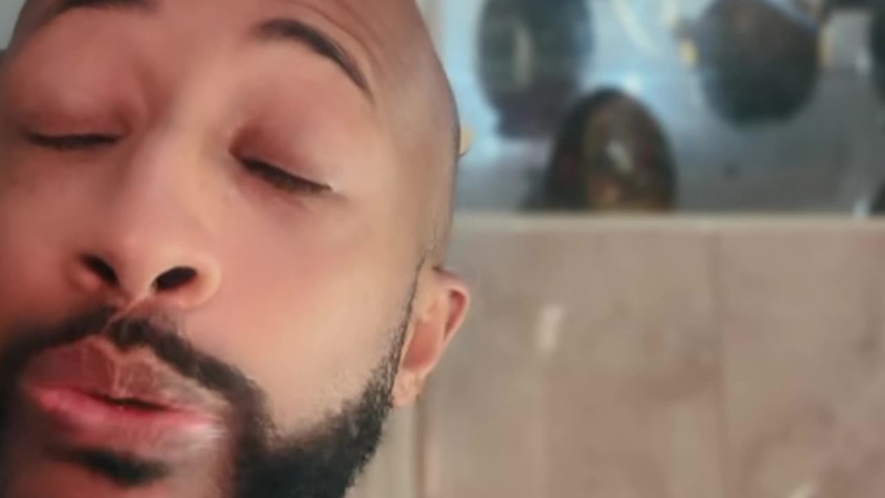 Trina up showing text of men, and singing his little heart