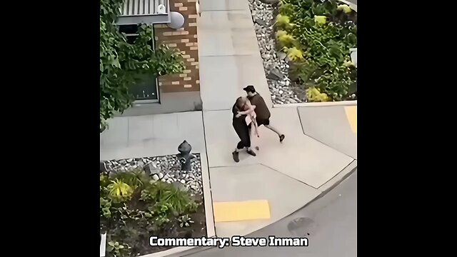 Hero helps an elderly woman after she was attacked with rocks.