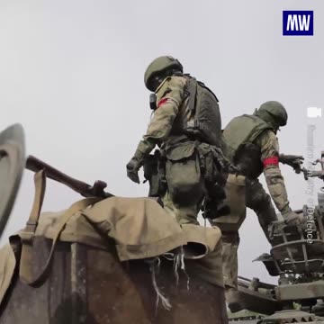 The crew of the anti-aircraft missile battery performing fire missions to destroy enemy drones