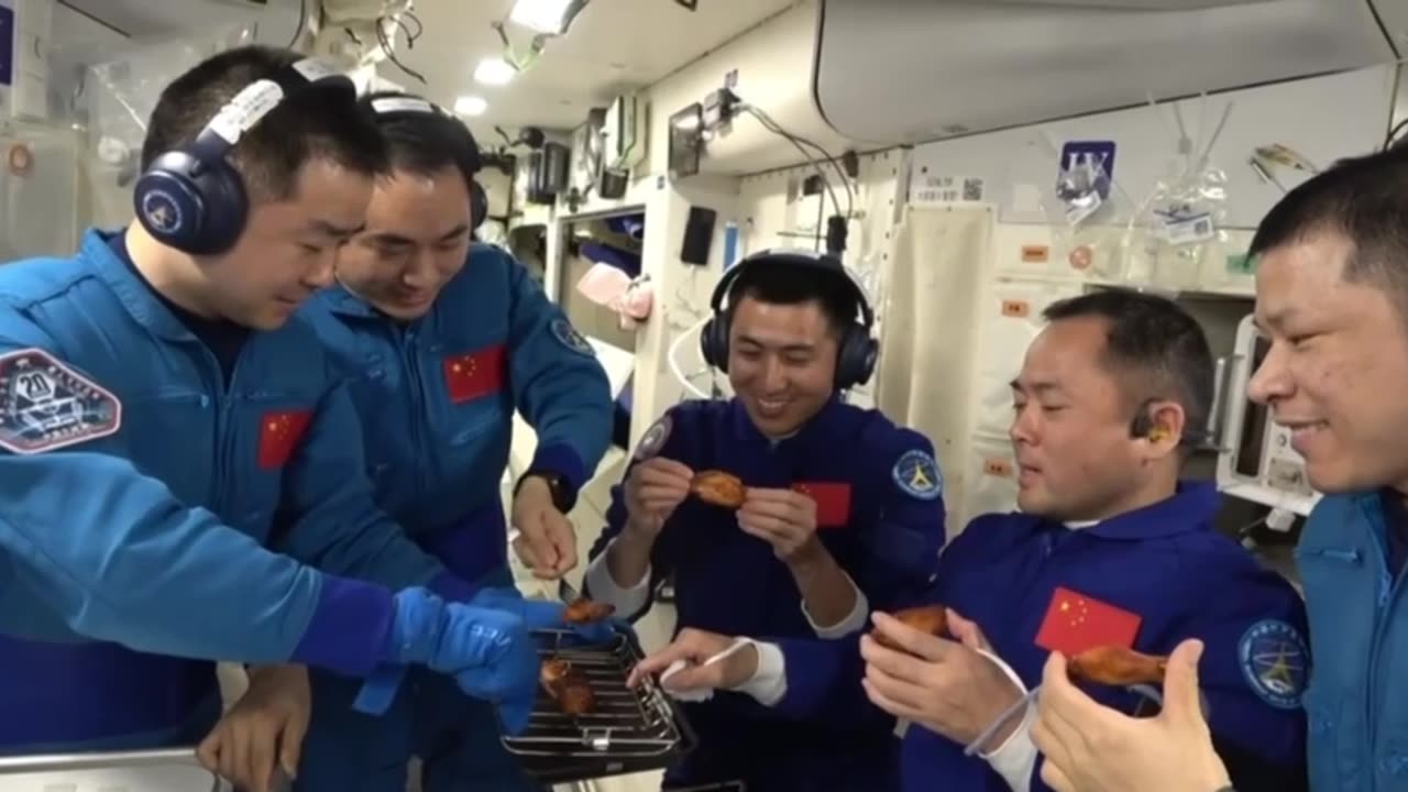Chinese Raincoats Enjoy BBQ Chicken in Space While 30% Of Their Population Starves