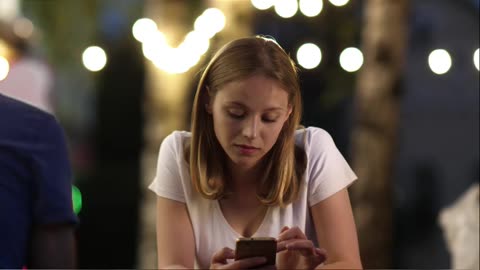 Why Do I Grab My Phone in Conversations?