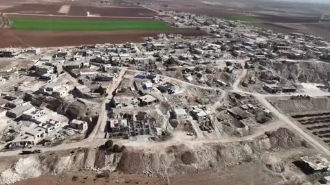 Syrians near Hama resettle in caves, lacking money to rebuild