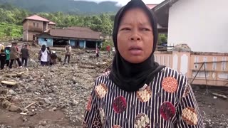 Indonesians salvage flood-damaged rice in flood aftermath