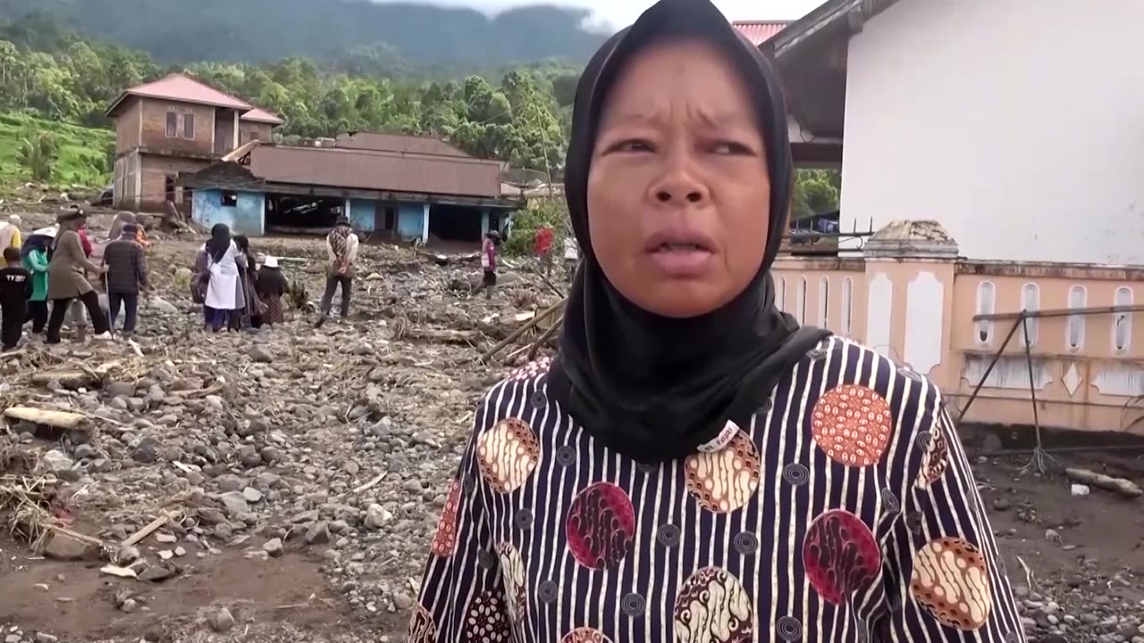 Indonesians salvage flood-damaged rice in flood aftermath