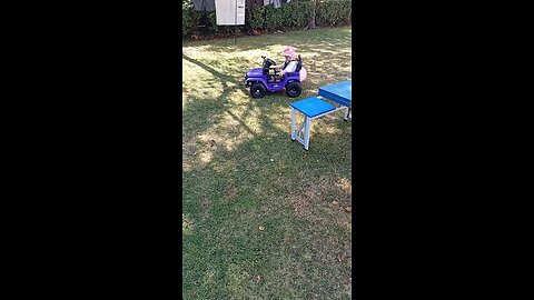 Our baby Talulla driving her jeep
