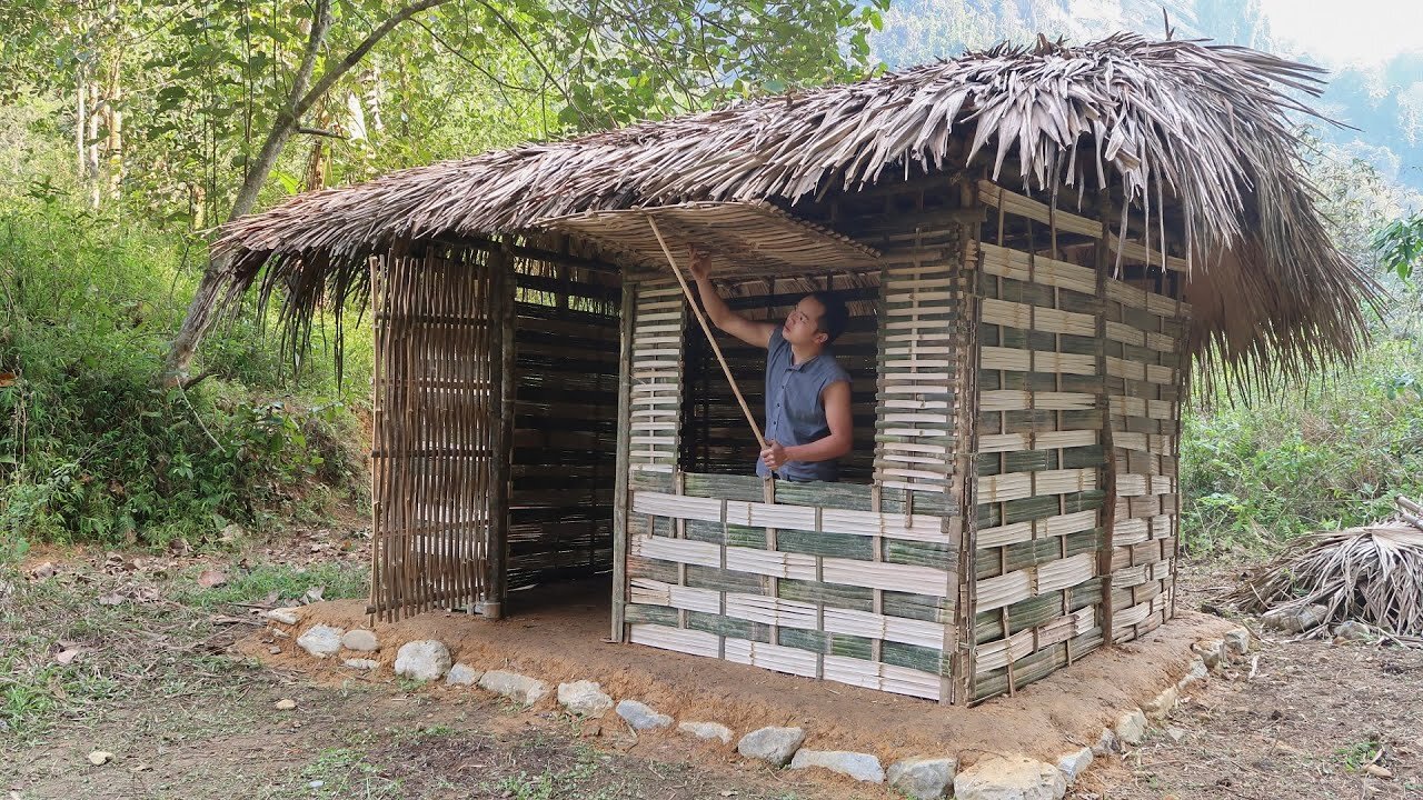 7 years ago! STONE AXE, PRIMITIVE TOOLS are what this guy used to build his first bamboo house.