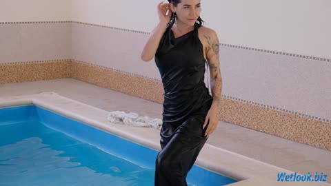 Wetlook girl in black dress and white shirt