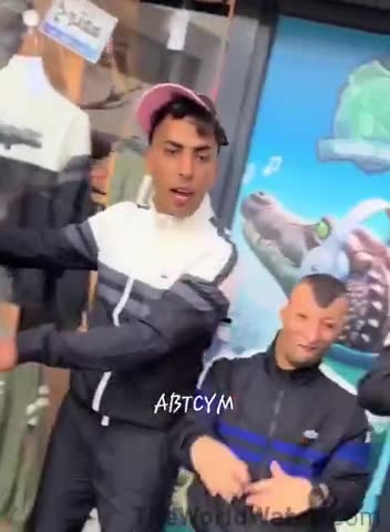 Inbred illegals in France show off the designer clothes they received for free