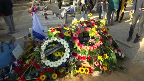 Live: Mourners attend funeral of Israeli hostage Oded Lifshitz