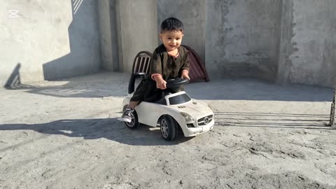 Yahya driving a car