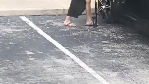 Woman Fixing A Flat Tire LOL