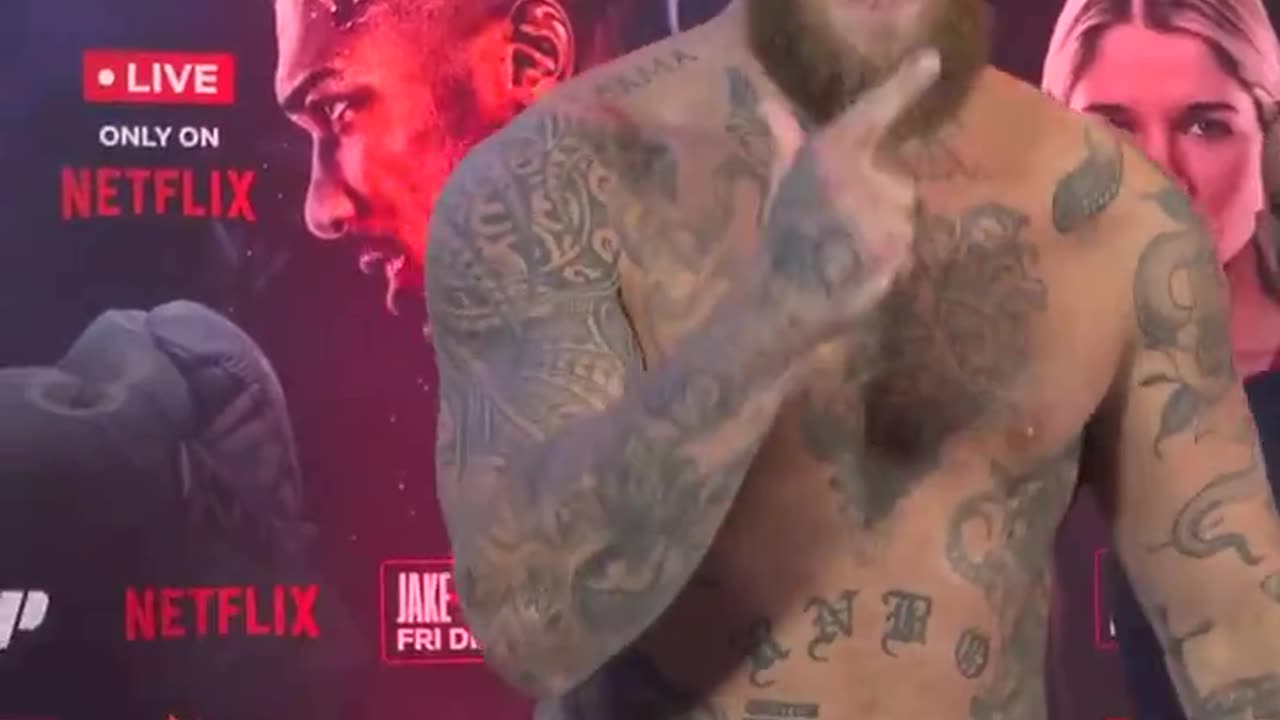 Jake Paul sent a bizarre message to Anthony Joshua as he weighed in for their heavyweight