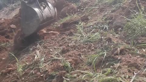 One Wrong Move… Excavator on a Mountain Slope