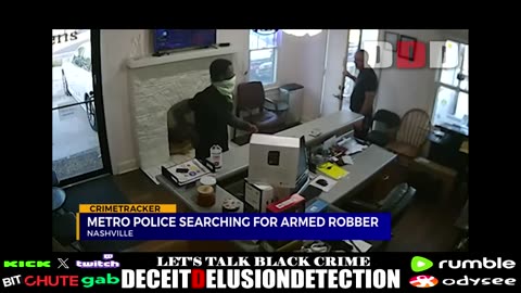 An armed black suspect pulls a gun on a white male locksmith employee