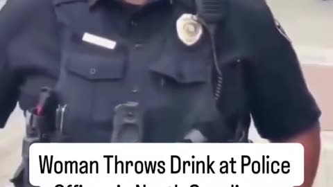 Female Cop-Hater Throws Drink at Officer