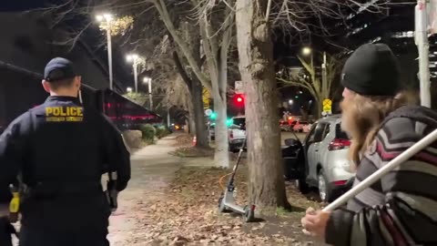 ICE agent desecrating the funeral of the murdered woman