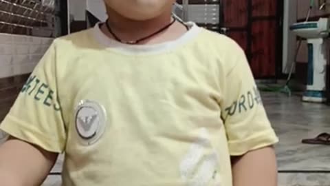 A little baby singing a song with his cute face😃😃😃