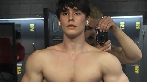 Handsome aesthetic bodybuilder showing off his muscles