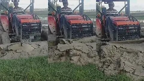 Amazing Kubota M6040SU Tractor Pushing Mud