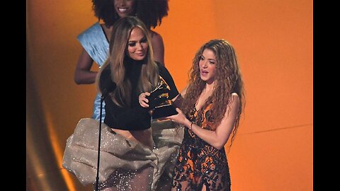 Shakira accepts her #Grammy from Jennifer Lopez