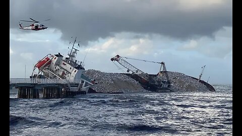 Rescuers work to prevent environmental damaged from cargo ship stranded in Tuscany